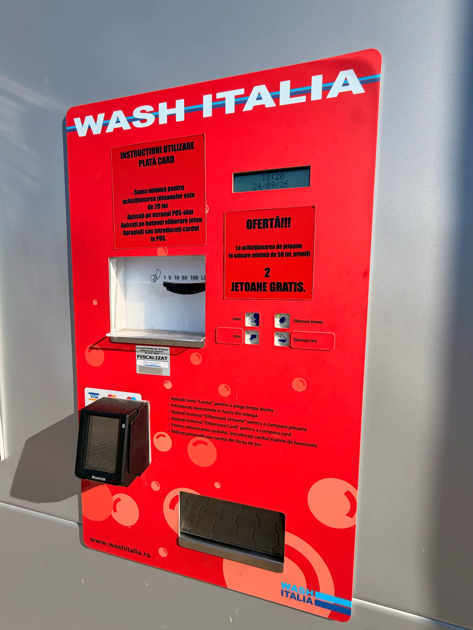 Bancomat jetoane spalatorie self service care accepta cash sau card